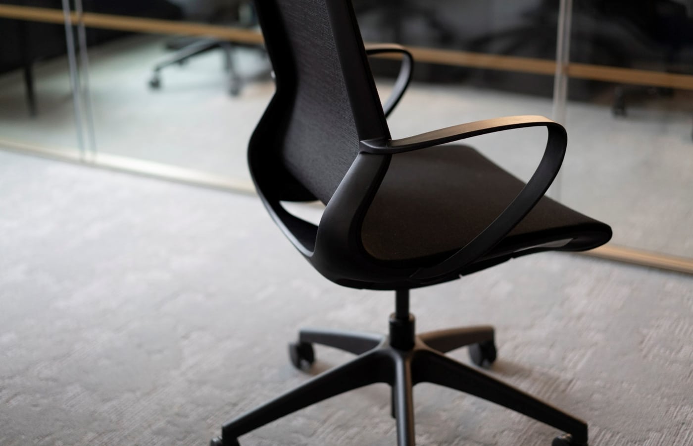 Modo executive mesh chairs in a boardroom setting