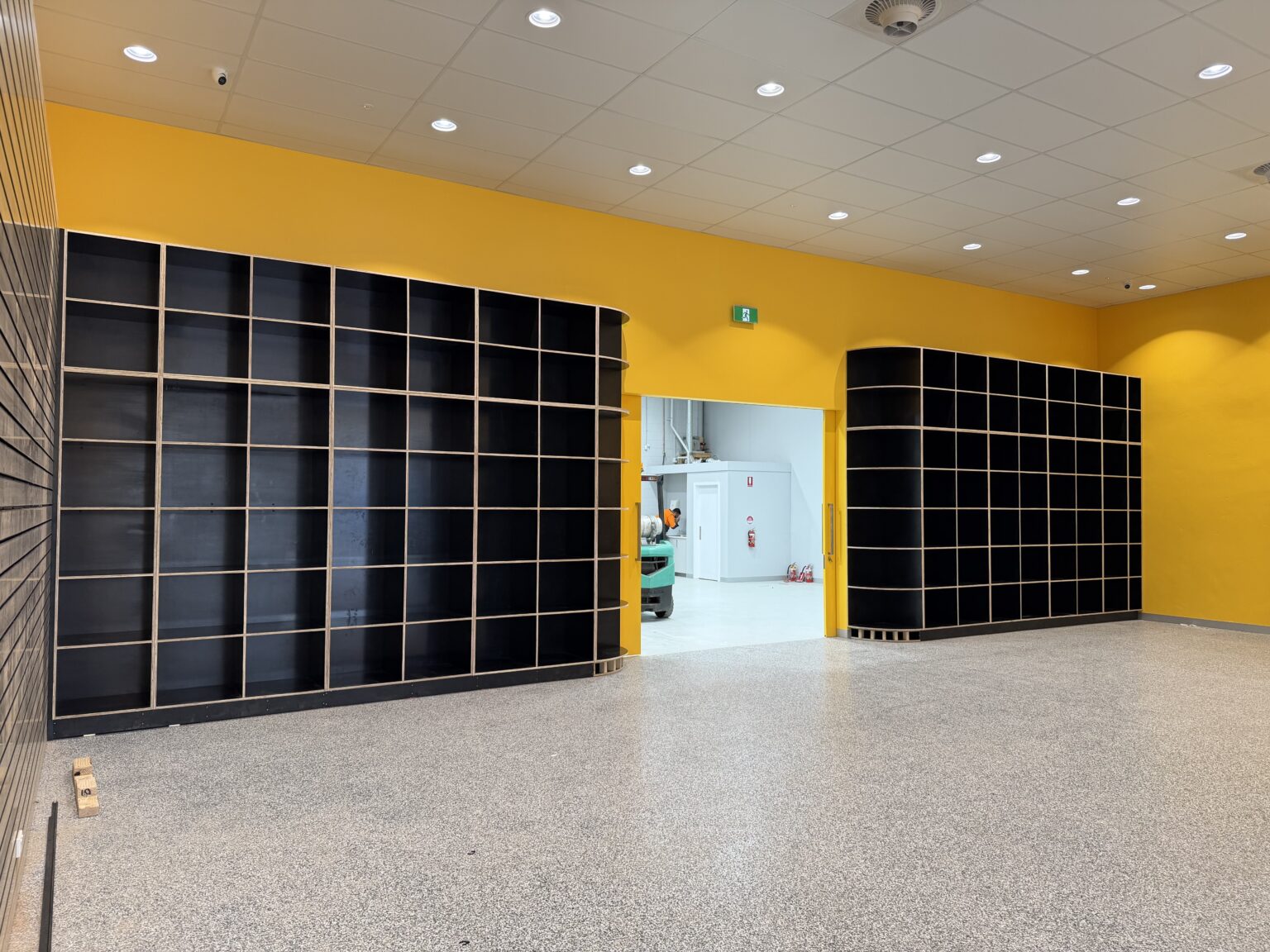 Custom commercial display shelving joinery installed by EFI Furniture